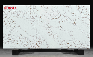 Calacatta Bulgari Artificial Quartz Stone with Light Brown And Grey Lines And Spots.